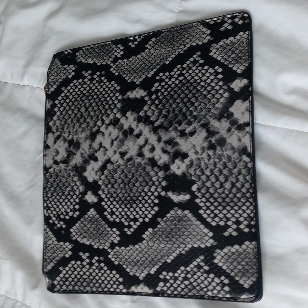 8in ×9 1/2in wide Black and light beige Also bag